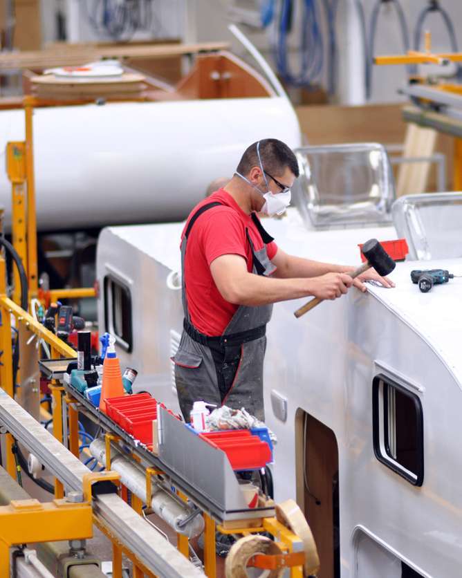 a man fixing vehicle