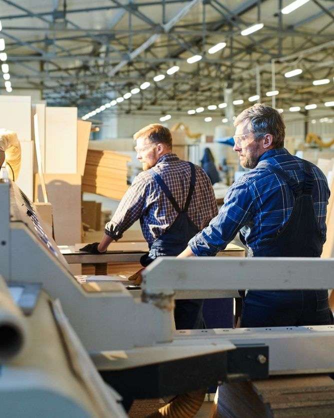 a group of people creating furniture